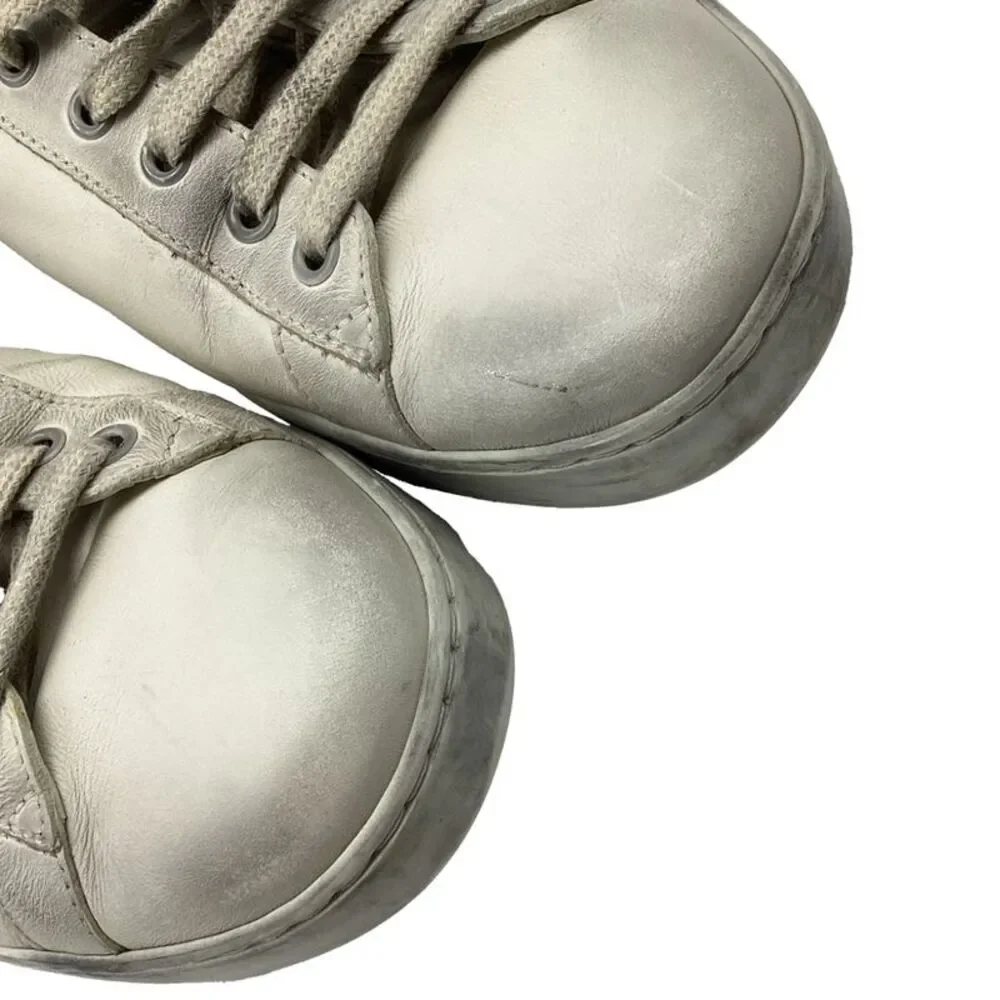 Gucci Ace Blade Distressed Sneakers in White Leather